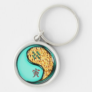 Porte-clés Aquarius et Tigre de Feu