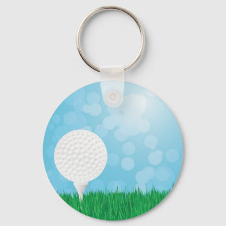 Porte-clés balle de golf sur l'herbe