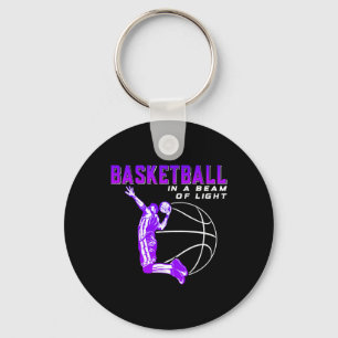 Porte-clés Basket-ball dans un rayon de lumière