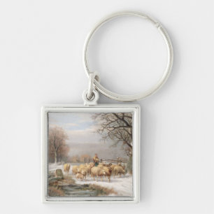 Porte-clés Bergère avec son troupeau dans un paysage d'hiver