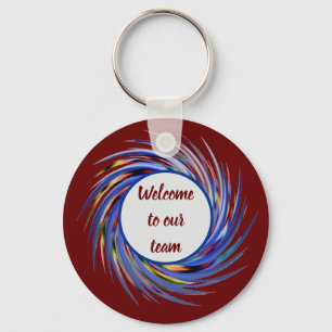 Porte-clés Bienvenue dans notre équipe Motif Spiral Nouveau e