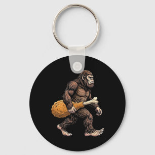 Porte-clés Bigfoot portant une cuisse de poulet amoureux de S