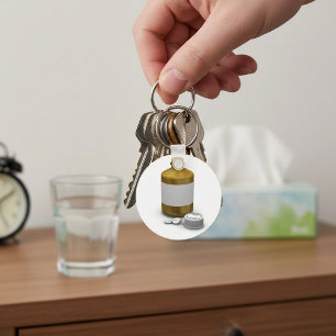 Porte-clés bouteille de comprimés
