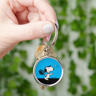 Porte-clés cacahuètes   Snoopy Joue Au Tennis