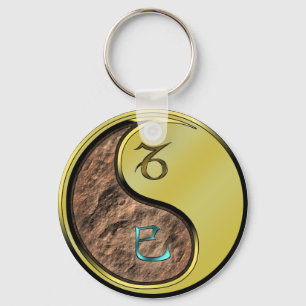 Porte-clés Capricorne et serpent métallique