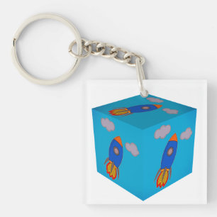 Porte-clés Cartoon Space Rocket Flying Et Blue Sky Cube