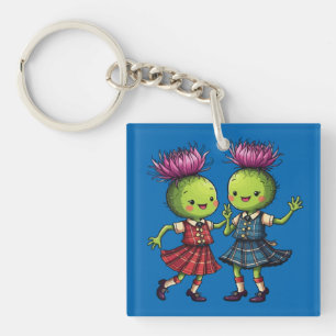 Porte-clés Chardons portant du tartan dansant une ceilidh éco