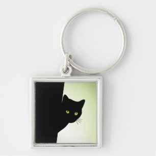 Porte-clés Chat noir à oreille verte