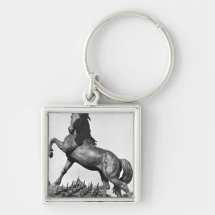 Porte-clés Cheval avec une herse