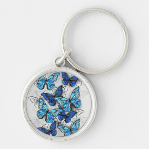 Porte-clés Composition de papillons blancs et bleus