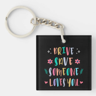 Porte-clés Conduisez en toute sécurité, quelqu'un vous aime