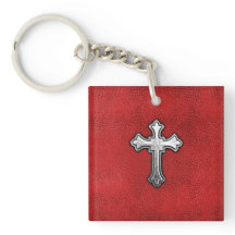 Croix en métal sur le cuir rouge
