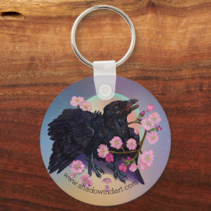 Porte-clés Crow naissant avec fleurs de pomme
