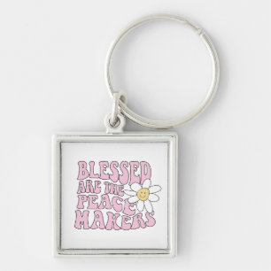 Porte-clés Daisy et les artisans de la paix Slogan