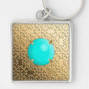 Porte-clés Damas d'or avec une fausse pierre turquoise