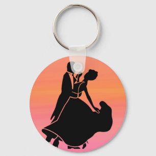 Porte-clés danceurs de soleil couchant tropical