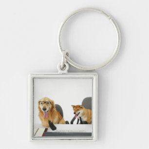 Porte-clés Deux chiens portant la cravate et les lunettes, se