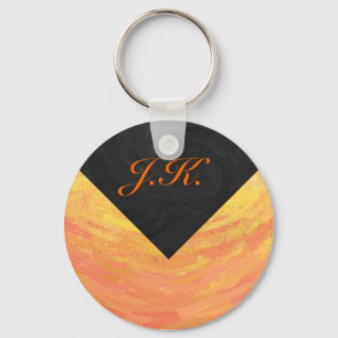 Porte-clés Dragons Oeil orange et noir Monogramme