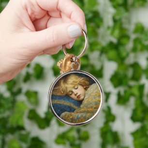 Porte-clés Enfant dormant rêvé dans une courtepointe fleurie
