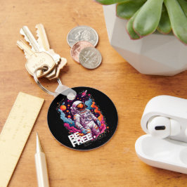 Porte-clés ÊTRE GRATUIT Conception des astronautes