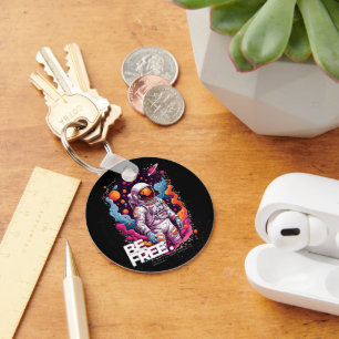 Porte-clés ÊTRE GRATUIT Conception des astronautes