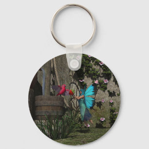 Porte-clés Fée mignonne nourrissant un oiseau