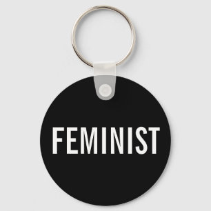 Porte-clés Feministe, texte blanc en gras sur le porte - clé 