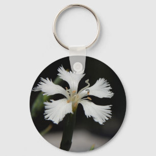 porte-clés fleur blanche
