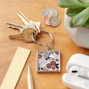 Porte-clés Fleurs de gribouillis et feuilles en rouge et noir