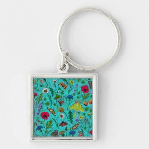 Porte-clés Fleurs sauvages et papillons de nuit sur turquoise