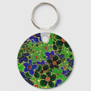 Porte-clés fleurs vertes et bleues avec garniture dorée