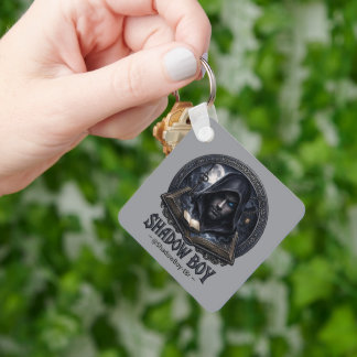 Porte-clés garçon d'ombre 