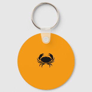 Porte-clés Glow océanique_Crabe noir sur orange