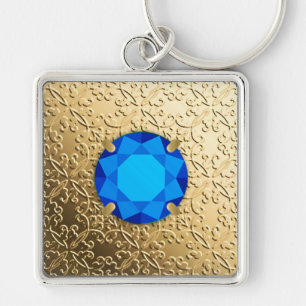 Porte-clés Gold Damask with a faux sapphire gemstone