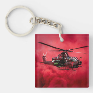 Porte-clés Hélicoptère de combat volant au-dessus de flammes