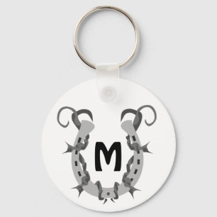 Porte-clés Horseshoe enveloppé dans un monogramme à fil Barbé