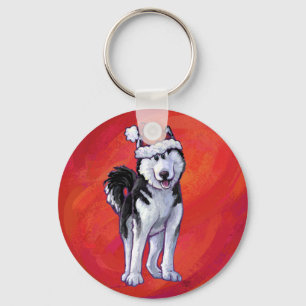 Porte-clés Husky à Santa Hat Sur Rouge