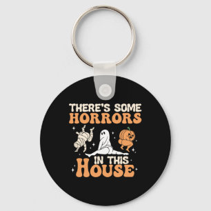 Porte-clés Il y a des horreurs dans cette maison Halloween am
