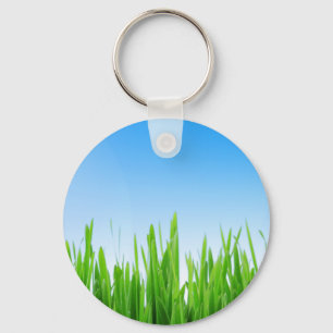 Porte-clés Jardin à l'herbe verte avec conception de ciel ble