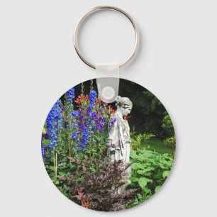 Porte-clés Jardin fleuri de delphinium bleu et statue