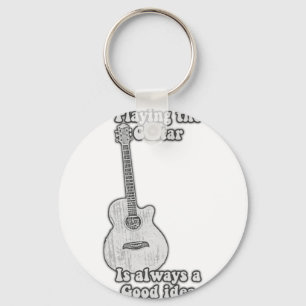 Porte-clés Jouer à la guitare est toujours une bonne idée. B 