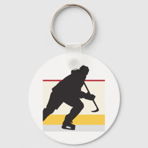 Porte-clés joueur de hockey sur glace en mouvement