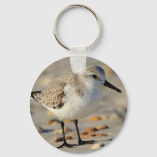 Porte-clés Joueur de pipeau et coquillages de sable