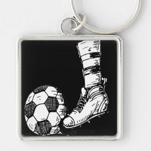 PORTE-CLÉS JOUEUR DU FOOTBALL NOIR ET BLANC