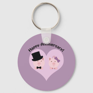 Porte-clés Joyeux couple de cochons à l'anniversaire
