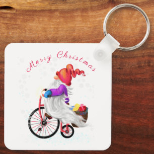 Porte-clés Joyeux Noël - Gnome amusant avec vélo et cadeaux
