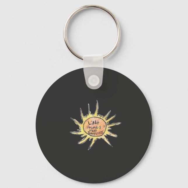 Porte-clés La Lumière Brille Par L'Obscurité (Recto)