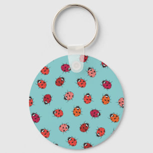 Porte-clés Ladybugs, arrière - plan bleu, charmant patte sans