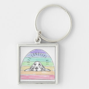 Porte-clés l'amour conquiert tout chien arc-en-ciel basset ho