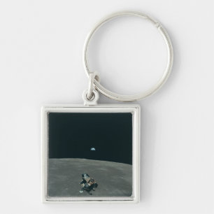 Porte-clés Lander lunaire Apollo et lever de terre sur la lun